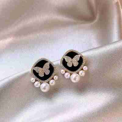 Black Butterfly Pearl Stud Earrings – Premium Anti-Tarnish Finish Profile Picture