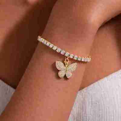 3.5 MM Moissanite Tennis Bracelet with Butterfly Charm in 925 Sterling Silver (14K Yellow Gold Plate Profile Picture